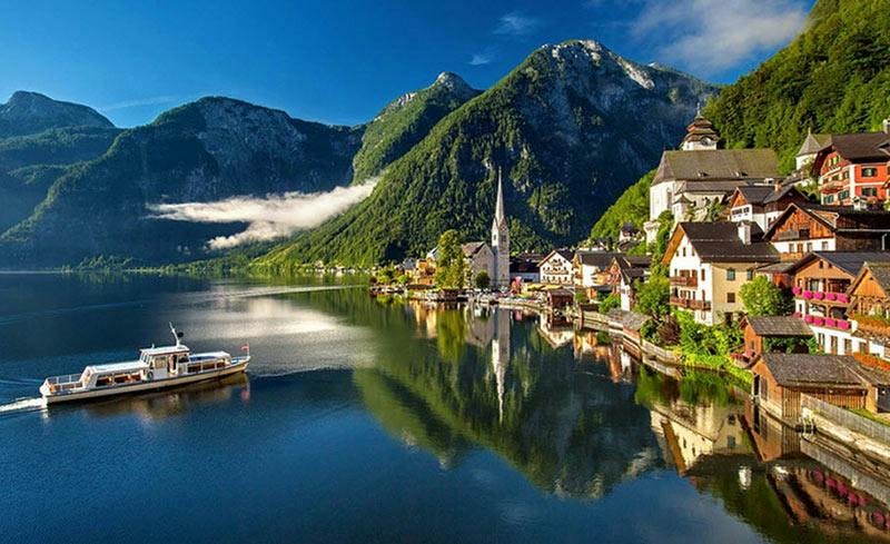 Österrike vacker by berg båt valuta euro